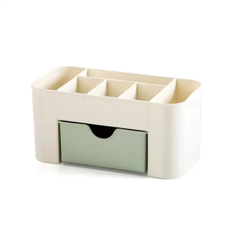 a white and green drawer with two compartments