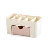a white and pink organizer with two compartments