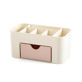 a white and pink organizer with three compartments