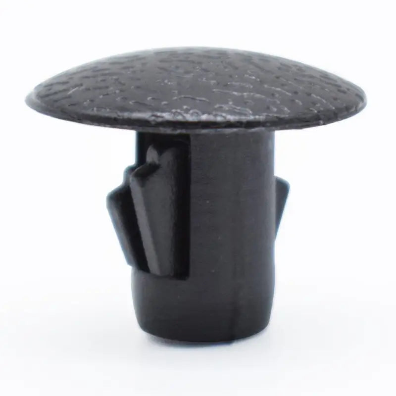 a black knob with a small hole on the top