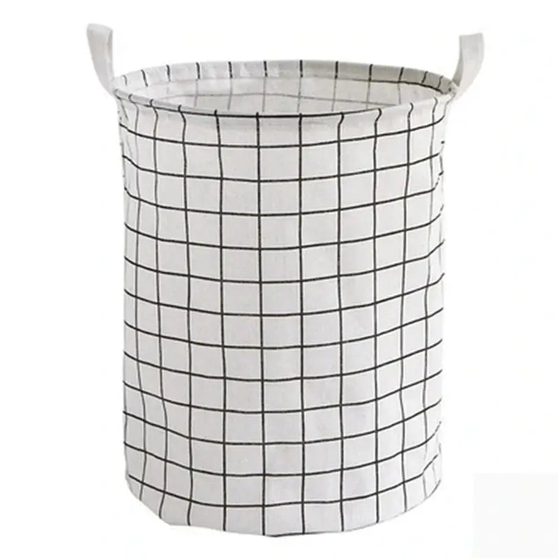 a white and black plaid fabric basket