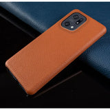 the back of a brown leather case