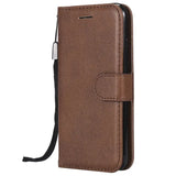 the back of a brown leather wallet case