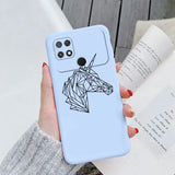 a woman holding a phone case with a geometric horse