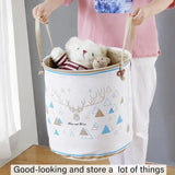 a little girl holding a white and blue basket