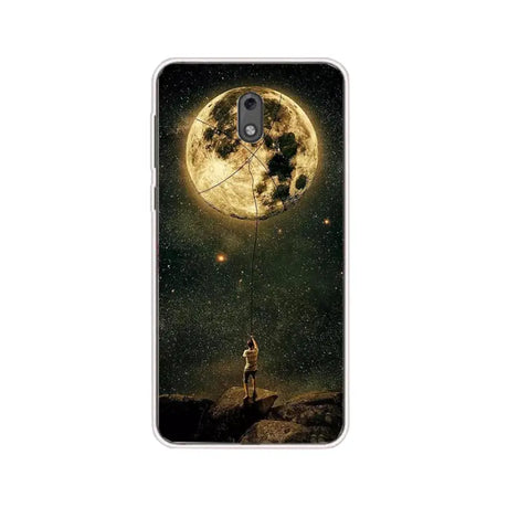 a girl standing on a rock looking at the moon