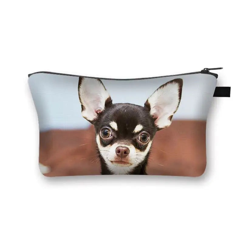 a small pouch bag with a chihuahua dog face