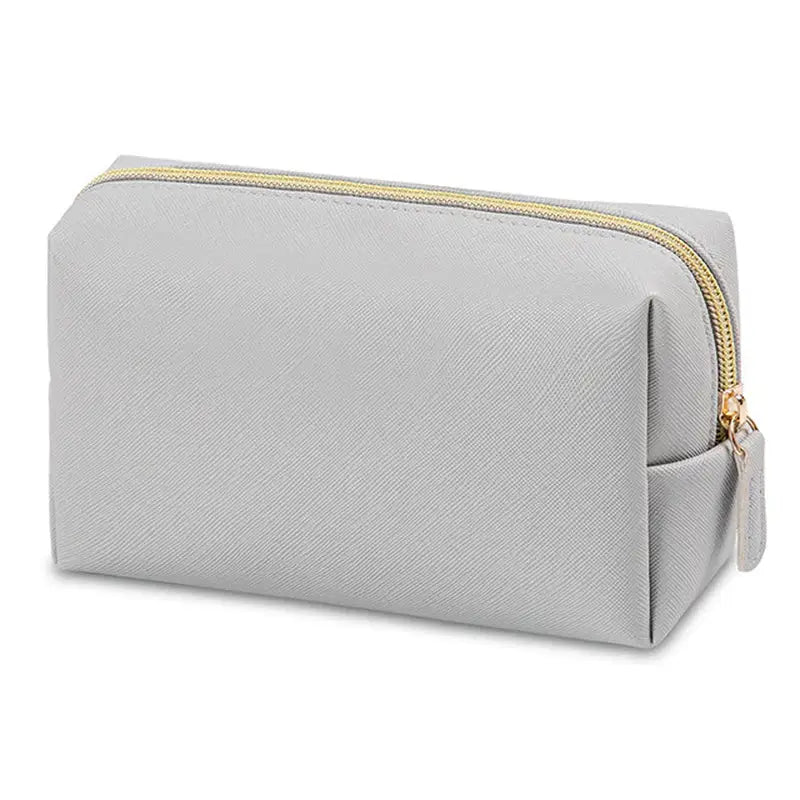 the grey and gold zipped cosmetic case