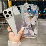 a woman holding a clear case with a white butterfly on it