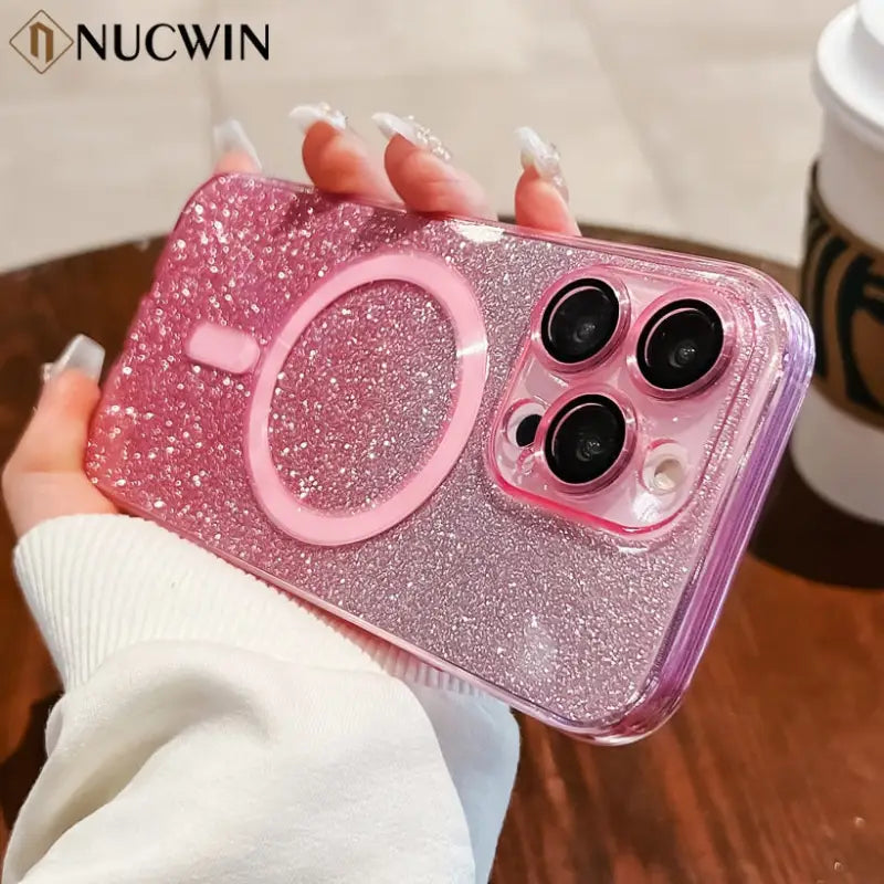 a girl holding a pink glitter case with minnie ears