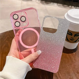 a person holding a phone case with a pink glitter phone