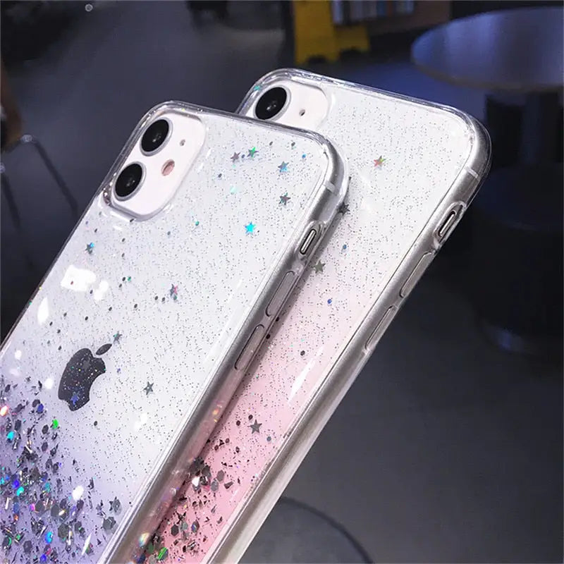a pair of iphone cases with glitter and stars
