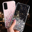 a hand holding a phone case with glitter stars
