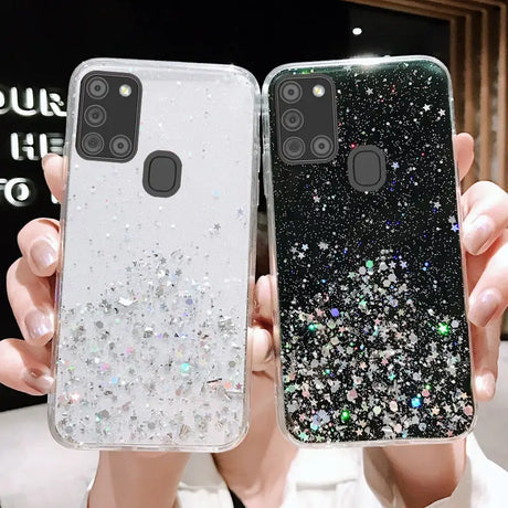 a woman holding up a phone case with glitter