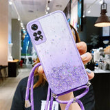 a woman holding a purple phone case with glitter