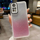 a woman holding a pink and white glitter phone case