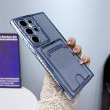 Glittery blue phone case with a built-in card holder and camera lens protection.