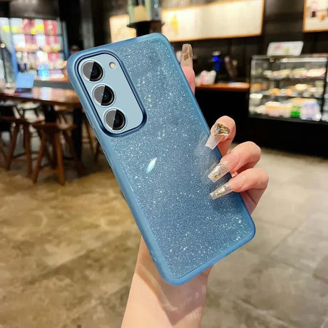 Glittery blue smartphone case with a triple camera cutout.