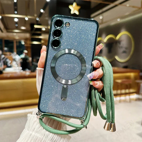 Glittery blue smartphone case with a circular magnetic ring and attached green lanyard.