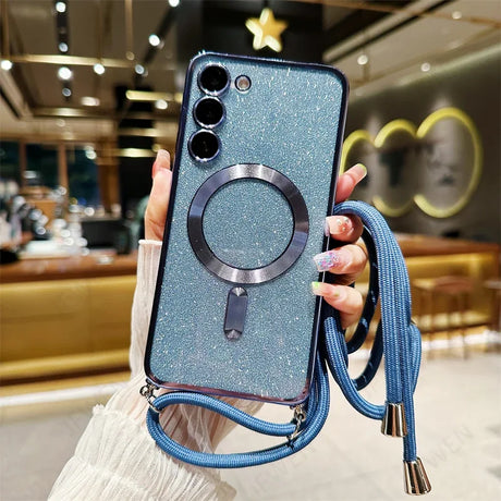 Glittery blue smartphone case with a built-in ring holder and attached blue lanyard.