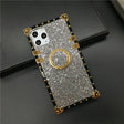 Glittery, gold-accented phone case with a ring holder and camera cutouts.