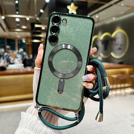 Glittery green smartphone case with a built-in ring holder and camera lens cutouts.