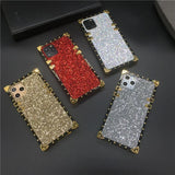 Glittery, jewel-encrusted smartphone cases in various colors with metallic edges.