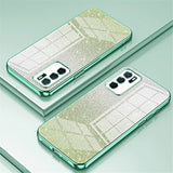 Glittery mint green smartphone cases with a geometric pattern and triple camera setup.