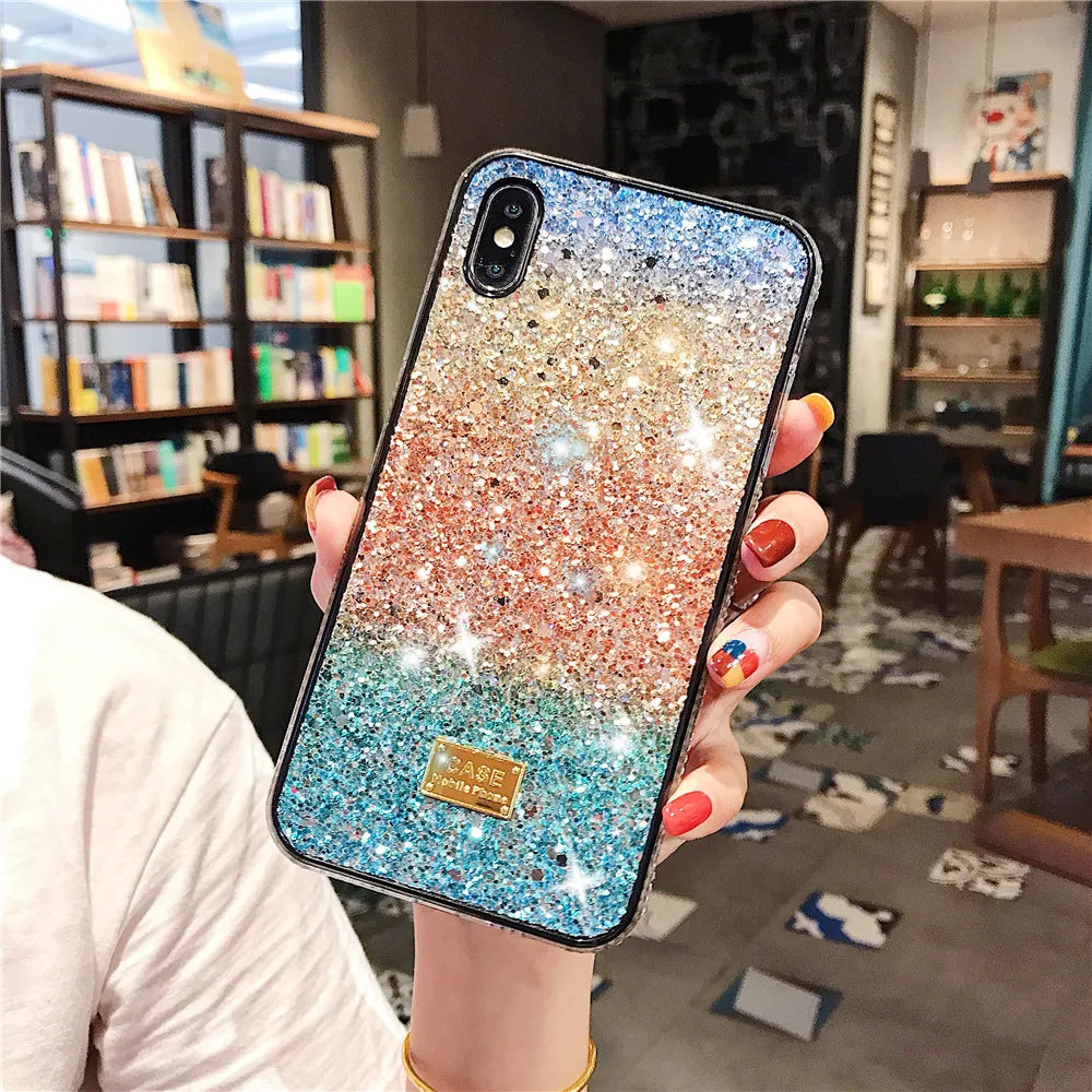 Glittery, multicolored phone case with a gradient effect from blue to pink to green.