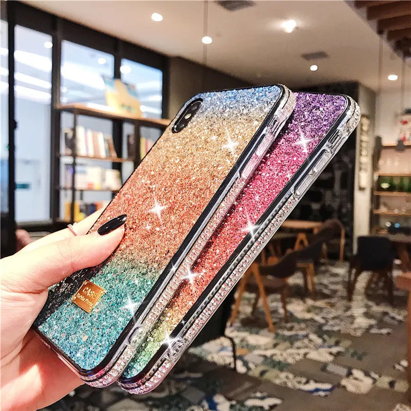 Glittery, multicolored smartphone cases with rhinestone-studded edges.