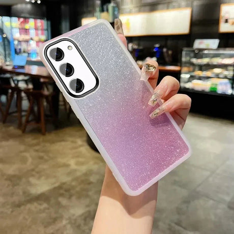 Glittery ombre phone case transitioning from silver to pink.