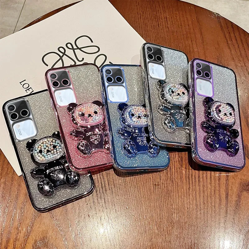 Glittery phone cases featuring cartoon panda designs in various colors.