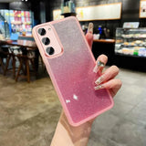 Glittery pink ombré smartphone case with three camera cutouts.