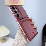 Glittery pink phone case with a camera protector and card slot.