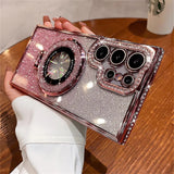 Glittery pink and silver smartphone case with a ring holder and decorative camera lens cover.