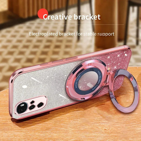 Glittery pink and silver smartphone case with a circular ring holder attachment.