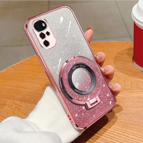 Glittery pink and silver smartphone case with a circular camera-like attachment on the back.