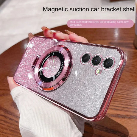 Glittery pink smartphone case with a magnetic ring and triple camera cutout.