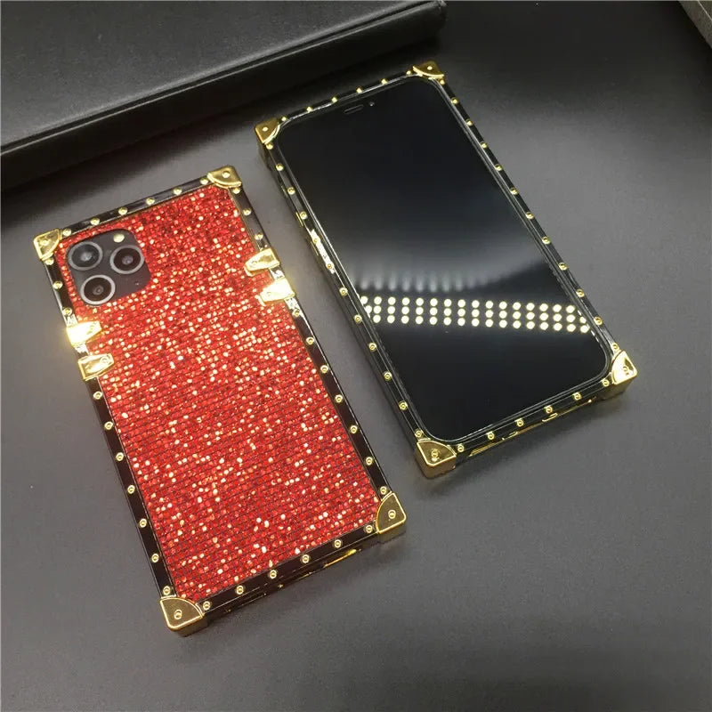 Glittery red and gold smartphone case with a square camera cutout.