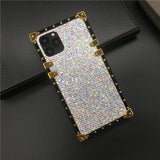 Glittery, rhinestone-encrusted smartphone case with gold-colored corner accents.