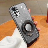 Glittery silver smartphone case with a circular ring attachment and multiple camera lenses.