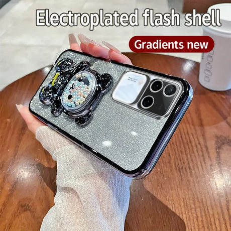 Glittery smartphone case with a decorative camera module design.