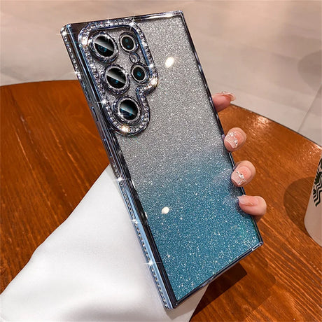 Glittery smartphone case with a gradient from silver to blue and a decorative camera module.