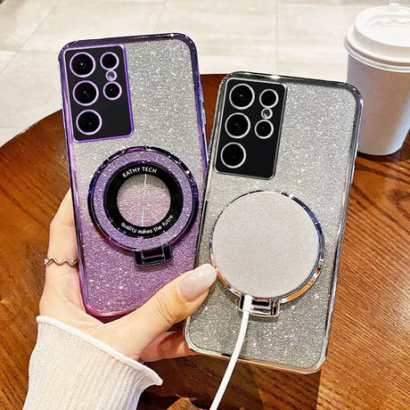 Glittery smartphone cases with built-in ring holders and multiple camera lenses.