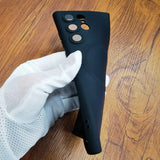 a glove is placed on the bottom of a black case