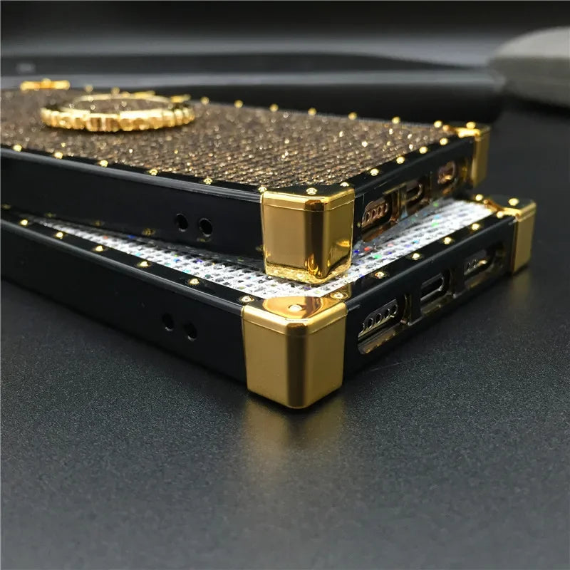 Gold-accented electronic device with a textured surface and visible ports.