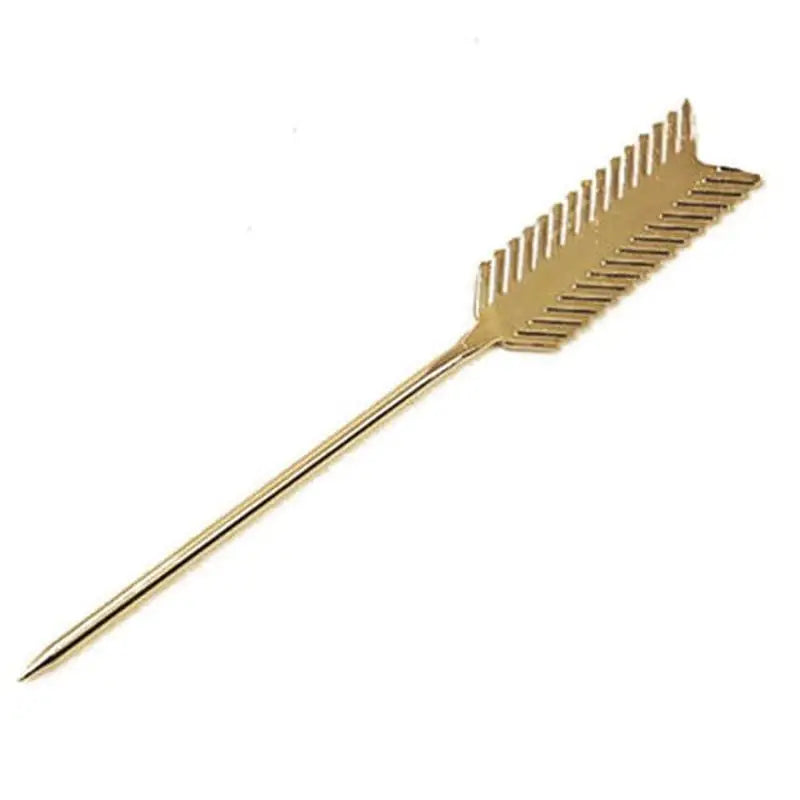 a gold arrow pin with a long tail