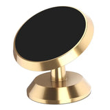 a gold and black mirror on a white background