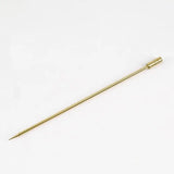 a gold pin with a long handle