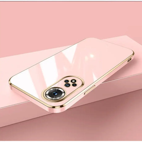 a gold iphone case with a camera on top